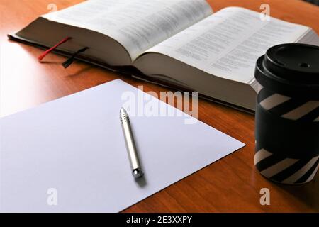 person writing on a notebook Stock Photo