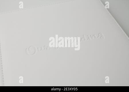 a white wedding photo book from white leather on white background Stock Photo