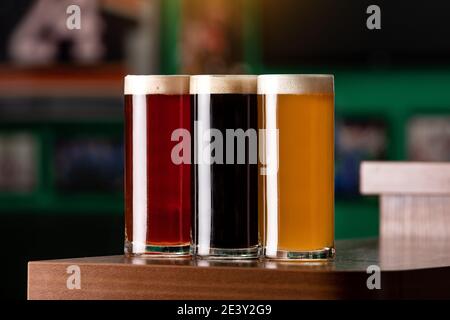 Different types of beer at the bar. Stock Photo