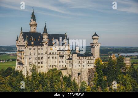 Beautiful view of world-famous Neuschwanstein Castle, the 19th century Romanesque Revival palace built for King Ludwig II, with scenic mountain landsc Stock Photo