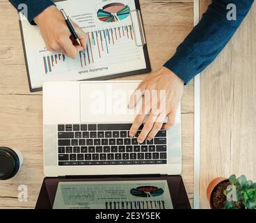 top view. business man analyzing financial charts. Stock Photo