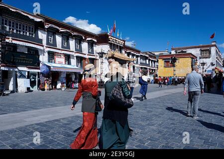 Pilgrims and tourists walking on Barkhor Street. Stock Photo