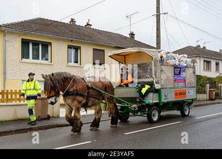 Charleville-Mezieres (north-eastern France): horse-drawn kerbside waste collection. Stock Photo