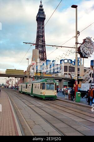 1960's Blackpool Twin Tramcars No's 677 & 687 on the sea front with Blackpool tower in the background in October 1999 Stock Photo