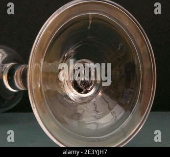 clear, close up, detail photograph of a folded foot on a Georgian glass c)1730 Stock Photo