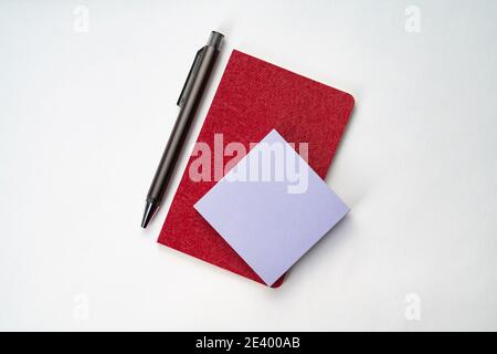 Topview of notebook with pen and sticky note Stock Photo - Alamy