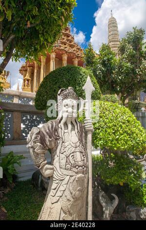 Wat Phra Kaew Temple, Grand Palace, stone statue, Bangkok, Thailand. Stock Photo
