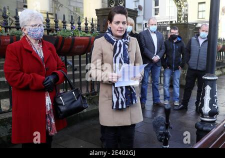 Oonagh McElhone, niece of the late Paddy McElhone, speaks to the media along with relatives, including Mr. McElhone's sister Mary (left), outside Omagh courthouse after a coroner delivered the findings of an inquest into his death. A farmer shot dead in cold blood by the Army during the Northern Ireland conflict has been exonerated, his family said. Paddy McElhone, 24, died instantly near his home in Pomeroy, Co Tyrone, in 1974 after he was fired on by a soldier from the First Battalion, the Royal Regiment of Wales. Stock Photo