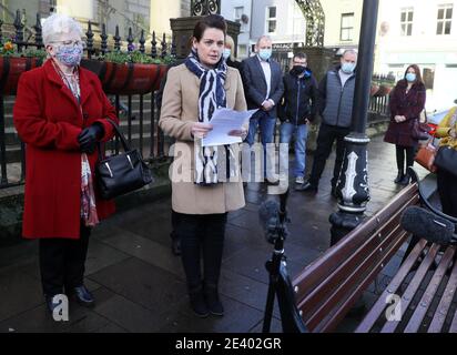 Oonagh McElhone, niece of the late Paddy McElhone, speaks to the media along with relatives, including Mr. McElhone's sister Mary (left), outside Omagh courthouse after a coroner delivered the findings of an inquest into his death. A farmer shot dead in cold blood by the Army during the Northern Ireland conflict has been exonerated, his family said. Paddy McElhone, 24, died instantly near his home in Pomeroy, Co Tyrone, in 1974 after he was fired on by a soldier from the First Battalion, the Royal Regiment of Wales. Stock Photo