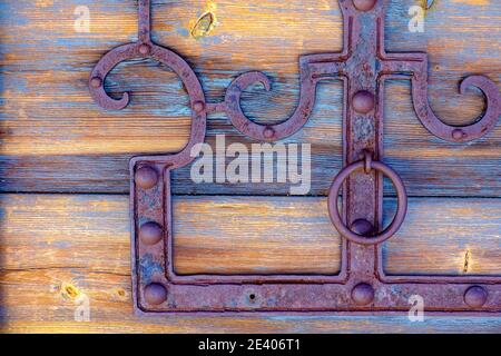 Old door fittings on a wooden Scandinavian barn Stock Photo