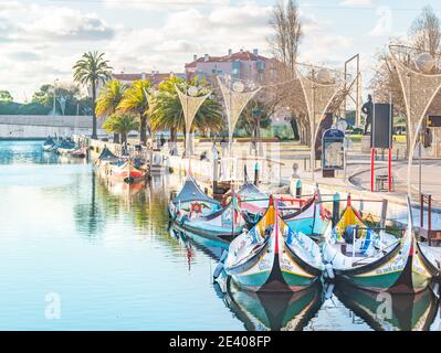 color image of the river with Moliceiro boats on the lagoon Centro Regionat during the day, northern, Aveiro, Portugal January 2021 Stock Photo