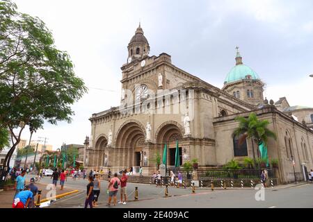 MANILA, PHILIPPINES - NOVEMBER 25, 2017: People visit the Cathedral of Immaculate Conception in Manila, Philippines. Metro Manila is one of the bigges Stock Photo