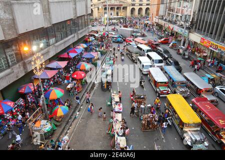 MANILA, PHILIPPINES - NOVEMBER 25, 2017: People drive in heavy traffic in Manila city, Philippines. Metro Manila is one of the biggest urban areas in Stock Photo