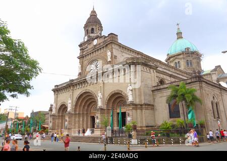 MANILA, PHILIPPINES - NOVEMBER 25, 2017: People visit the Cathedral of Immaculate Conception in Manila, Philippines. Metro Manila is one of the bigges Stock Photo