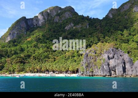 Beach landscape in Palawan island, Philippines. Seven Commando Beach. Stock Photo