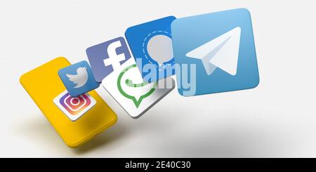 Istanbul, Turkey - 01.17.2021: Telegram vs whats app concept. View from above of 3D rendered famous social media application icons on white background Stock Photo