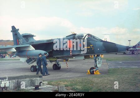 1975 RAF Finningley air display airshow 1975 Two RAF servicemen walking towards the Jaguar XX748 on static display . This Jaguar GR1 is coded '20' of 226 OCU Lossiemouth.The photo is taken 20 Sep 1975 at an air show at  RAF Finningley airfield Doncaster South Yorkshire England UK GB Europe Stock Photo