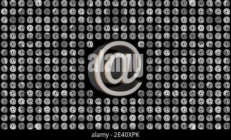 Significant @ sign integrated into wall of @ signs colored in white on black background - Information and Internet Technology concept Stock Photo