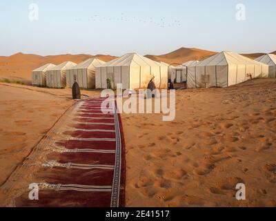 Tented camp in the dunes of the Sahara desert in Morocco Stock Photo