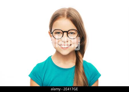 Vision correction for children. Smiling child with stylish eyeglasses isolated on white background Stock Photo