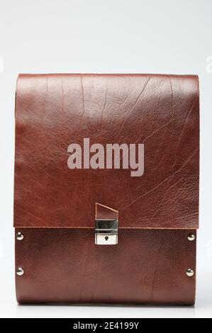 Brown leather document bag with buckle front view isolated Stock Photo