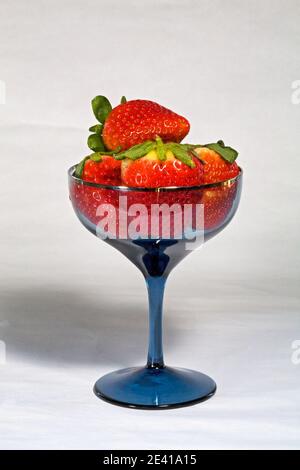 Fresh, sweet, red strawberries straight from the vegetable garden, in a champagne glass. Stock Photo