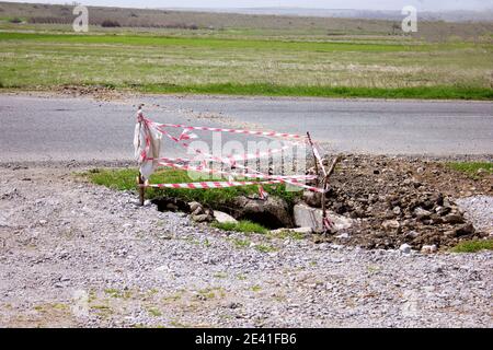 Road closed sign before the road construction. Stock Photo