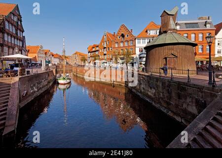 Old town of Stade, historic merchant and warehouse houses at the Hanseatic harbor with the wooden crane, Germany, Lower Saxony, Stade Stock Photo