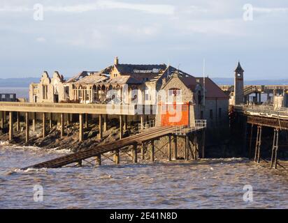 Derelict shell of the once thriving Birnbeck Pier in Weston super Mare on the Somerset coast UK Stock Photo