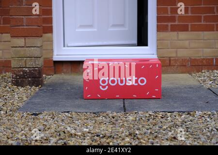 Exeter, UK-January 2021: A Gousto food delivery box in front of a doorstep in Exeter. Gousto supplies subscribers with recipe kit boxes