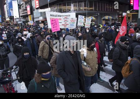 Marcher head down 7th Avenue speaking out against Donald Trump and the Capital Insurrection with many avowed Socialists and anti-Fascists among them i Stock Photo