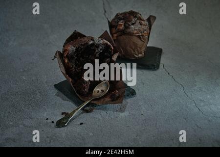 chocolate muffins on a dark background Stock Photo