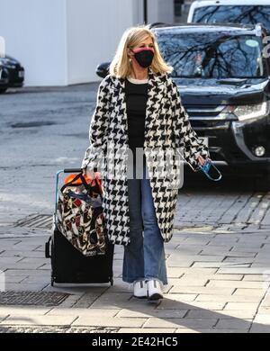 Kate Garraway wearing a face mask arrives at the Global Radio Studios in London Stock Photo