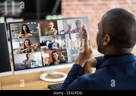 Disabled Deaf Man In Video Conference Call Stock Photo