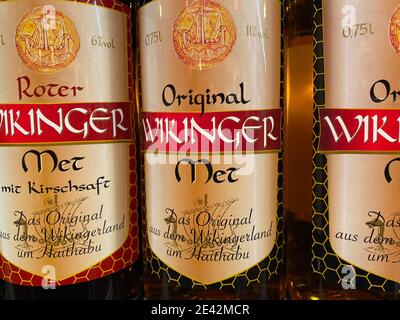 Viersen, Germany - January 9. 2020: Closeup of bottles with Wikinger honey wine met in shelf of german supermarket (focus on central bottle) Stock Photo