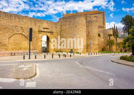 View of the Arab walls with the door of Almocabar, in Ronda, Andalucia, Spain. Stock Photo