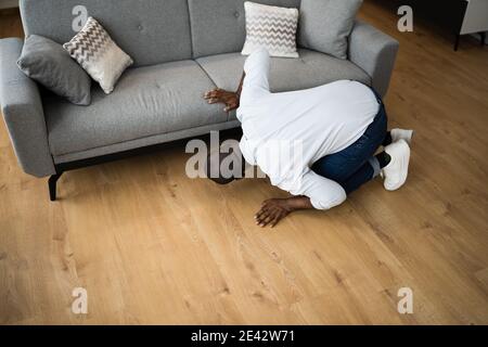 Lost Something. Looking For Keys Or Things Stock Photo