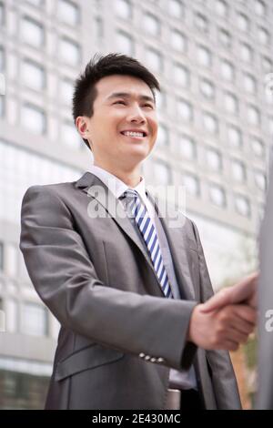 Portrait of a Business man shaking hands high quality photo Stock Photo