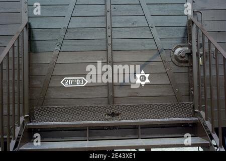 Large black swastikas were found painted on a French memorial at a Holocaust deportation site outside Paris in Drancy, France, on April 11, 2009. They were daubed on a railway wagon used to deport French Jews and on a commemorative pillar. A 1.5 metre (five foot) swastika was painted on the wagon, another one metre high was found on the pillar and a third was painted on the wall of a shop about 500 metres away. A Jewish student group Saturday condemned the vandalism at Drancy. From 1941 to 1944 Drancy served as the main transit camp for French prisoners of the German SS. More than 76,000 peopl Stock Photo