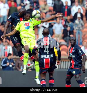 PSG s Zoumana Camara and Le Havre s Amadou Alassane during the