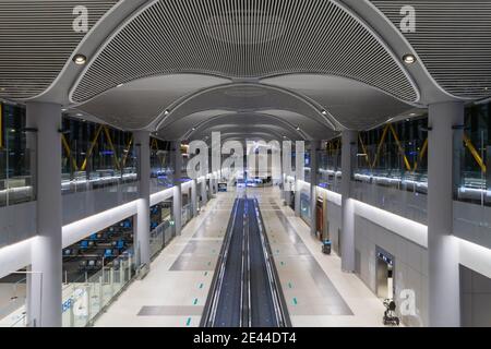 Empty airport during Corona (Covid-19) pandemic by night, Istanbul Airport, Turkey Stock Photo