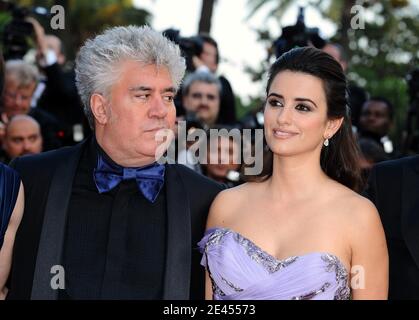 Penelope Cruz and Pedro Almodovar arriving at the screening of 'Los Abrazos Rotos' during the 62nd Cannes Film Festival in Cannes, France on May 19, 2009. Photo by Lionel Hahn/ABACAPRESS.COM Stock Photo