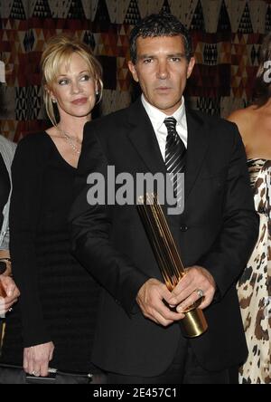 Award recipient Antonio Banderas and wife Melanie Griffith pose during ...