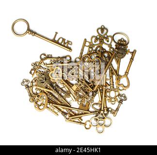 Old, vintage keys in the shape of a heart isolated on white bacground Stock Photo