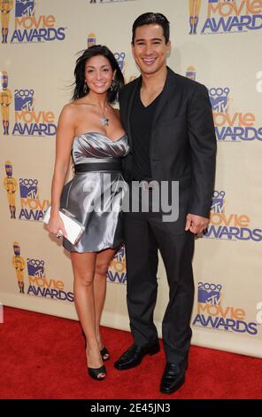 Mario Lopez with girlfriend Courtney Laine Mazza attend the 18th Annual MTV Movie Awards held at the Gibson Amphitheatre in Los Angeles, CA, USA on May 31, 2009. Photo by Lionel Hahn/ABACAPRESS.COM Stock Photo