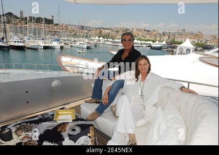 EXCLUSIVE - Roberto Cavalli and his wife Eva Duringer posing aboard on their yacht in the harbour of Cannes during the 62nd International Cannes Film Festival in Cannes, France on May 19, 2009. Photo by Nebinger-Orban/ABACAPRESS.COM Stock Photo