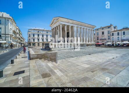 Maison Carrée, the ancient Roman temple in Nîmes is one of the best preserved Roman temples to survive in the territory of the former Roman Empire, Ga Stock Photo