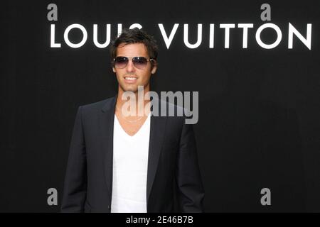 Bordeaux's soccer player Yoann Gourcuff with a friend during Louis Vuitton  the men's 2009-2010 spring-summer ready to wear (French PAP) collection  show held at 'Le 104 Centquatre' in Paris, France, on Juin