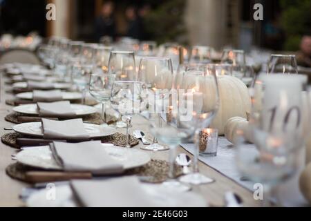 Elegant dinner table served on a garden Stock Photo