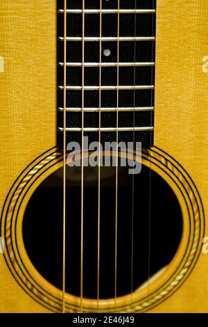 Six Strings Over Sound Hole Stock Photo